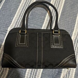 Elegant Black Coach Handbag with White Stitching